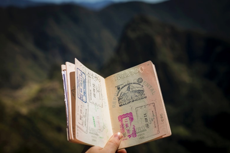 open passport with stamps