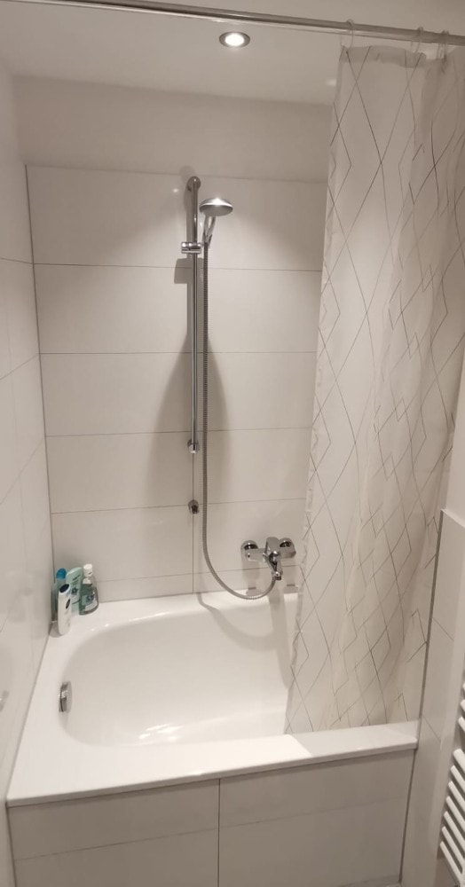 Typical German Shower in a Bathtub